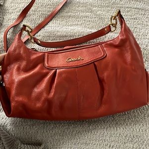 Coach orange leather hand bag